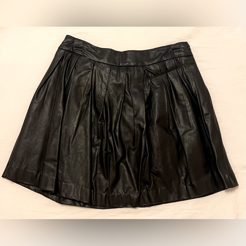 Forever 21 black faux leather pleated mini skirt. Size medium